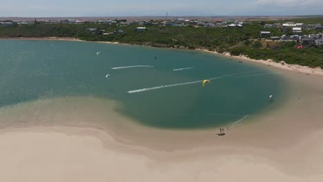 aerial view of kitesurfing at witsand beach, south africa, sunny day
