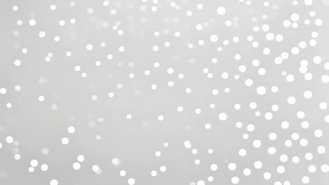 white bokeh lights animation over gray background