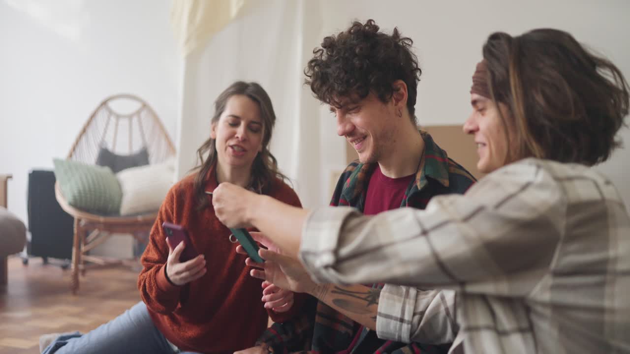 Friends sharing a phone