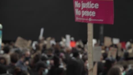 A-BLM-Sign-Being-Marched-Through-London-Crowd-of-Protestors