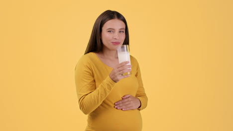 pregnant woman drinking milk