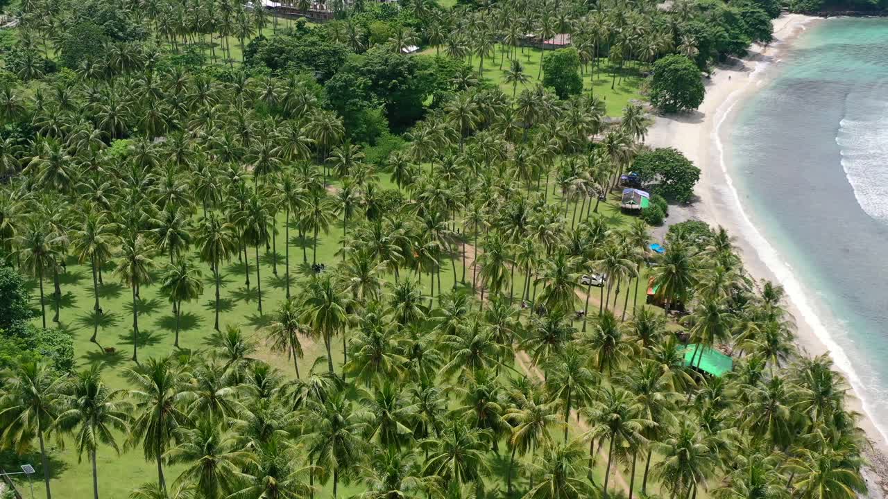 Wide aerial coastline of Kerandangan Beach in Senggigi Lombok on sunny day