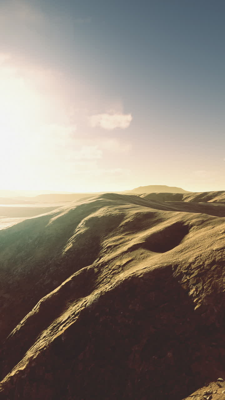 Breathtaking sunrise over rolling hills in a serene landscape