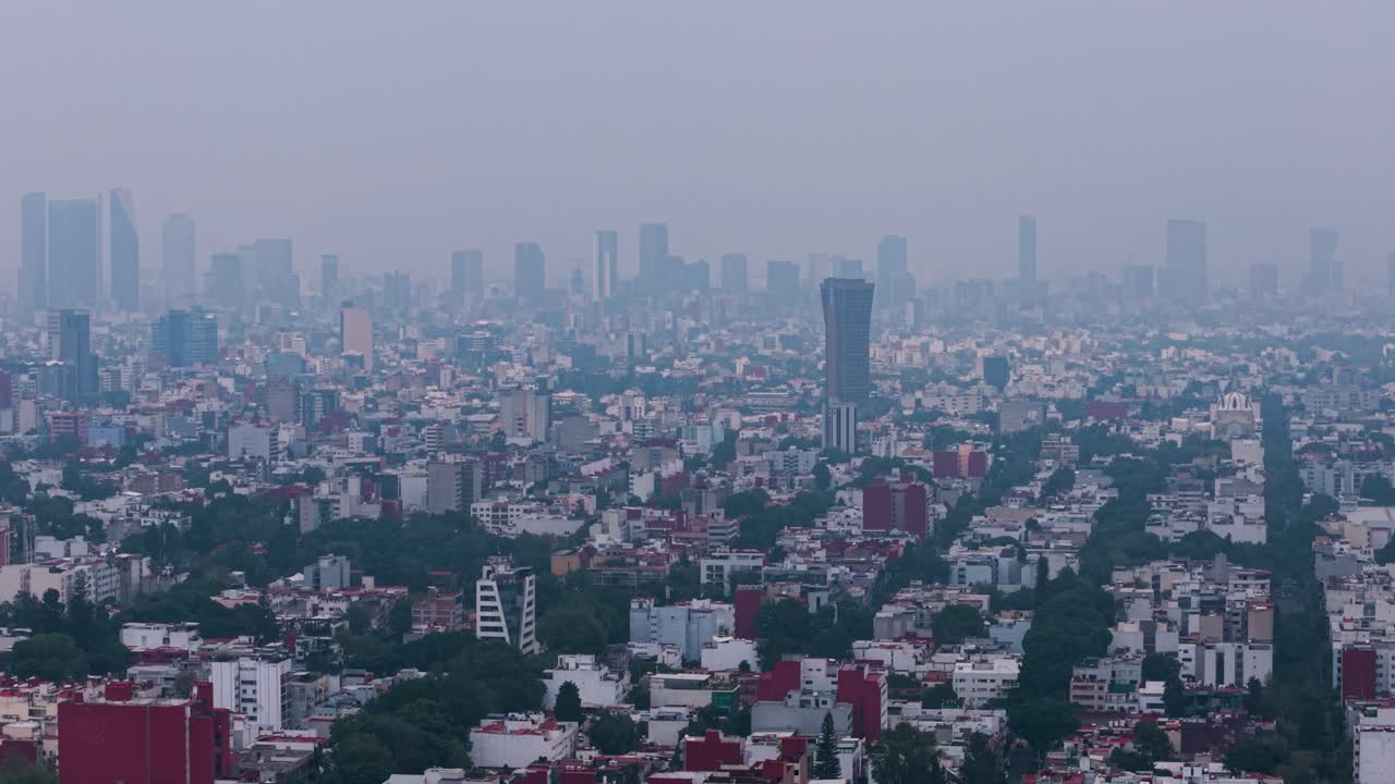 Drone footage showing Mexico City covered in smog, from Colonia del Valle neighborhood