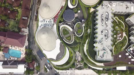 aerial view of a modern resort complex with lush landscaping