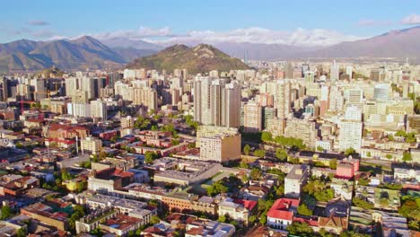 aerial wide panoramic shot of santiago, chile, andean cordillera sky background near concha y toro neighborhood