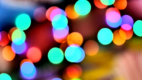 blurred colorful lights. red, green, yellow, orange, blue defocused glittering bokeh festive background. abstract multicolored light.