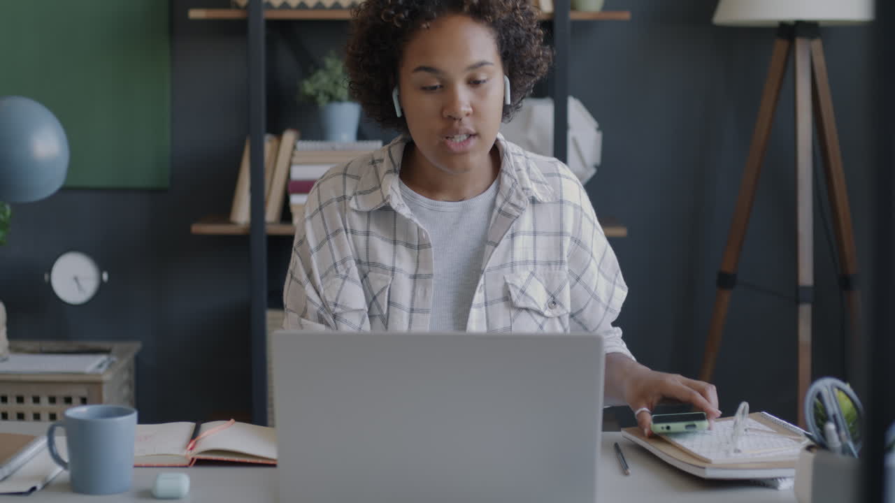 Woman working from home, studying, or attending online class