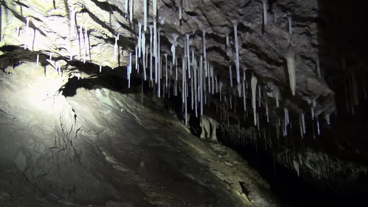 Premium stock video - Cave formations, soda straws, flowstone, ribbons ...