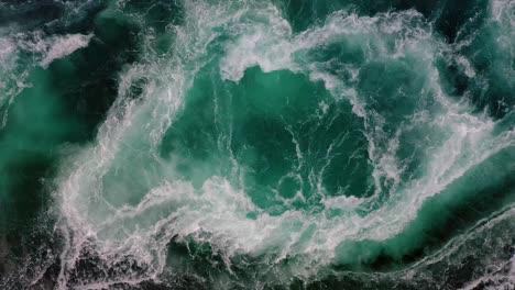 waves of water of the river and the sea meet each other during high tide and low tide.