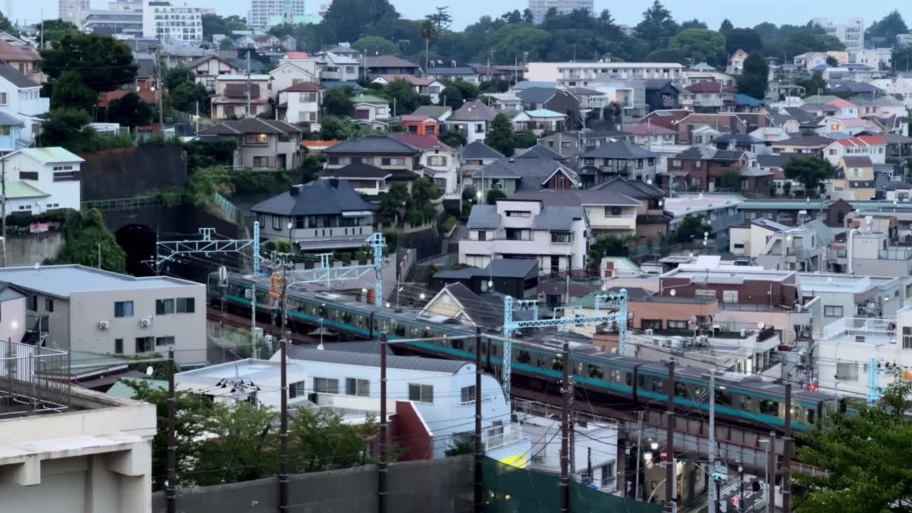 Cityscape with train and houses