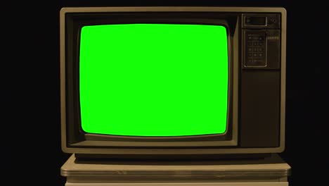 vintage television with a green screen cut out