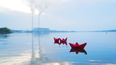 paper boats floating on a river. origami.