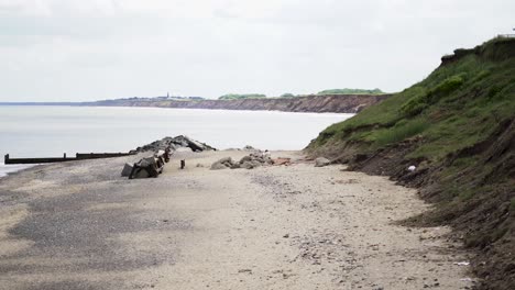 Wide-shot-of-English-rocky-beach-in-Hornsea