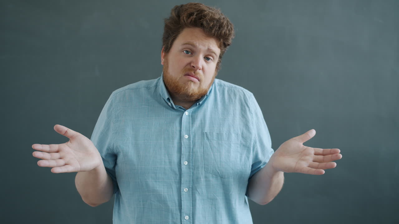 Confused Man Shrugging