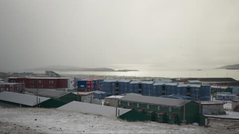 cold northern town on the coastline after snow fall