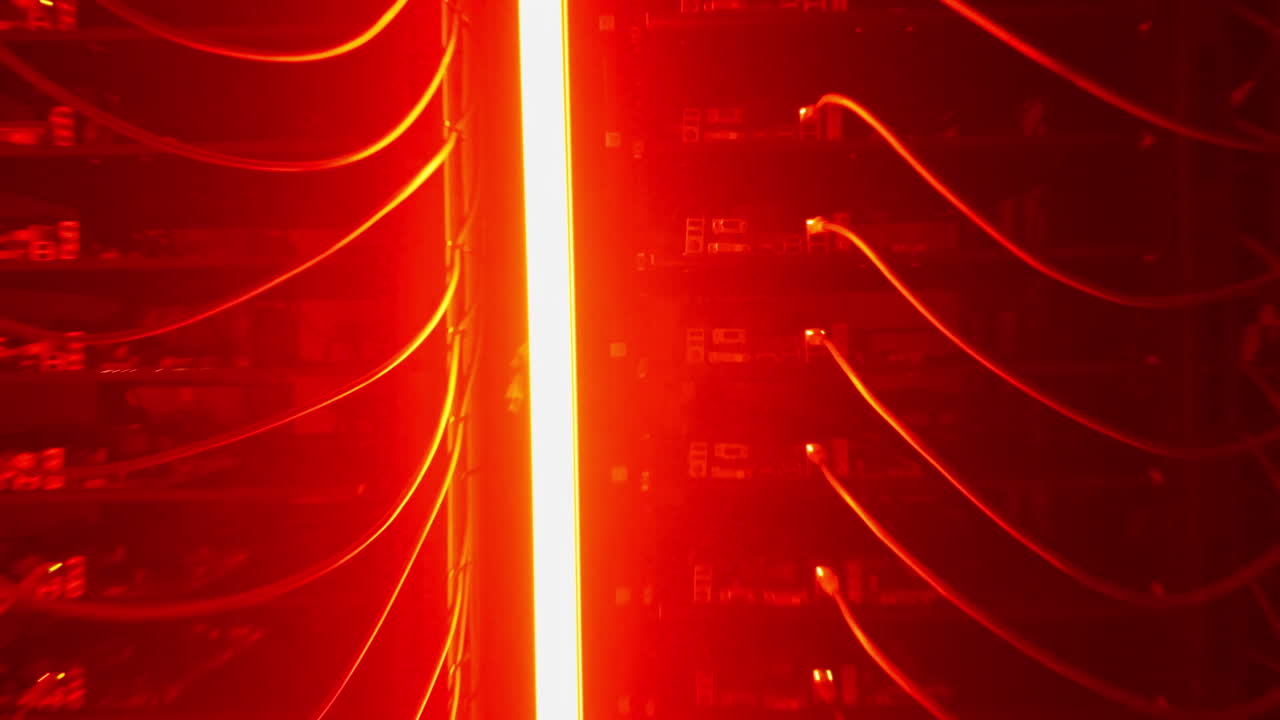 Multiple servers with flashing red lights in a data center