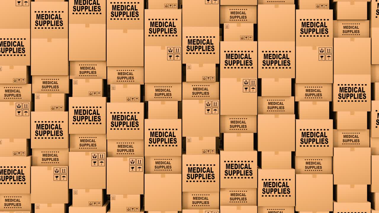 의료 용품과 기부품이 들어있는 카드보드 상자의 엄청난 양은 루프 할 수 있습니다.
