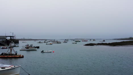 Zoom-dolly-Hitchcock-effect-over-marina-in-Maine-with-fishing-and-lobster-boats-HD-30p