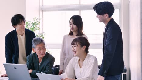 business persons working in an office