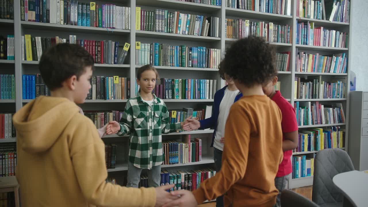 Multinational children play entertaining game in library
