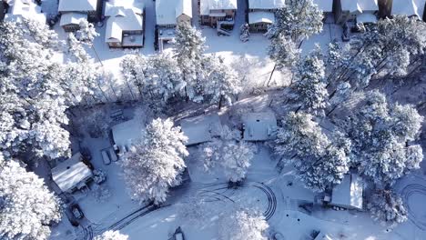 Drone-flyover-of-snowfall-on-Raleigh-NC-roads-and-houses