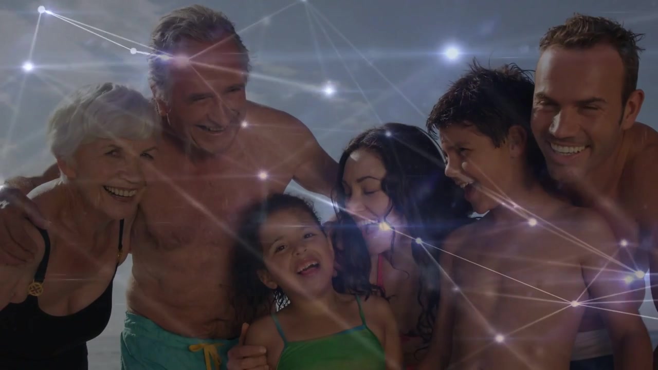Timer che segnala una famiglia che si stringe sulla riva, in posa, adulti che abbracciano bambini che ridono, con una sovrapposizione CGI in movimento.