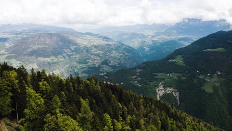 drone shot of italy's mountainous landscape over colle