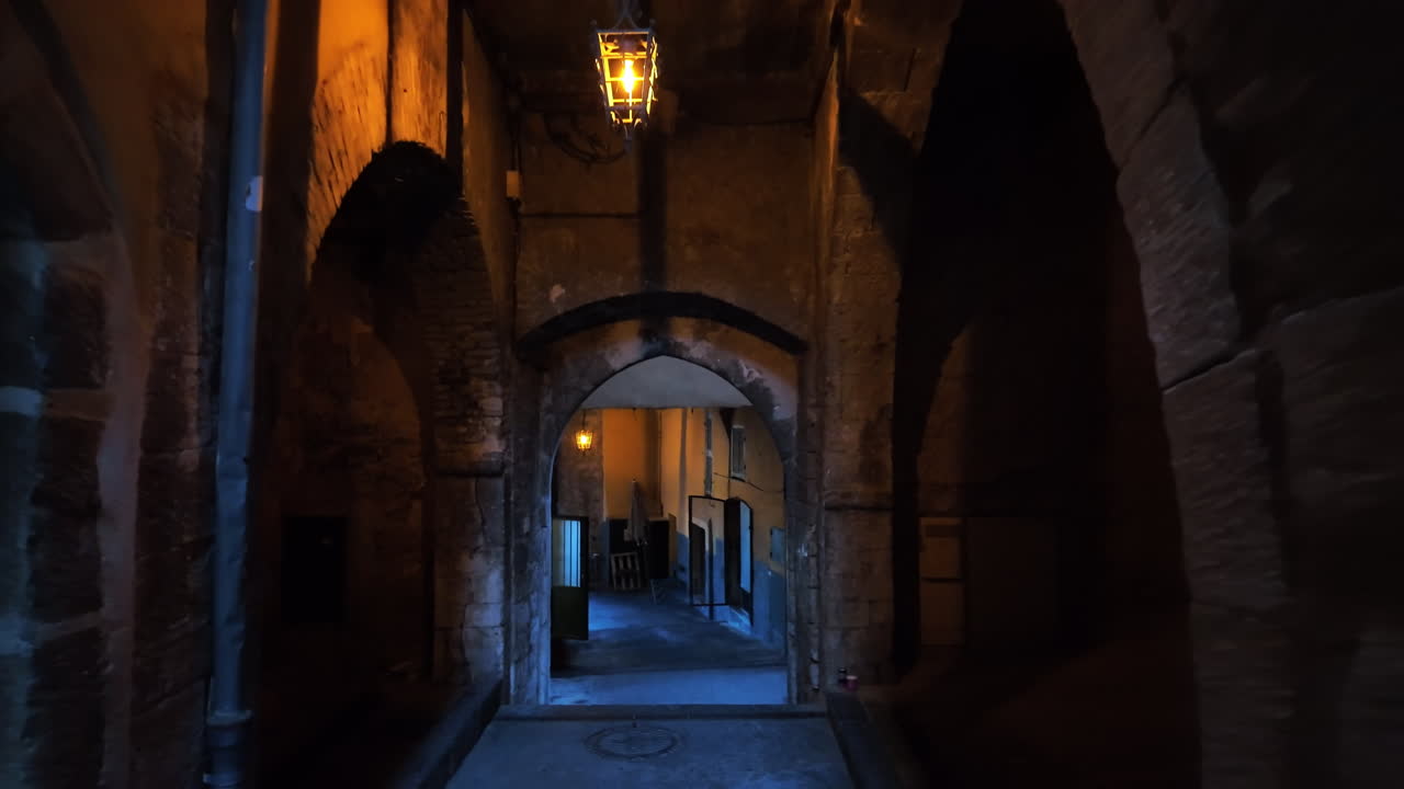 A walk down the streets of Villefranche-sur-Mer, France near old buildings in the evening