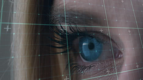 animation of data processing over eye of caucasian woman