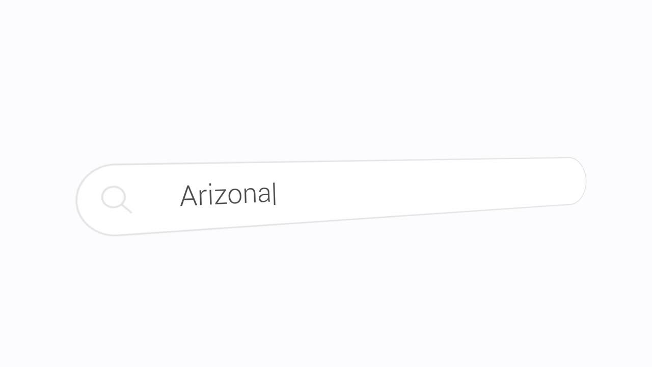 Searching For Arizona In Web Browser By Typing In Search Box. closeup shot