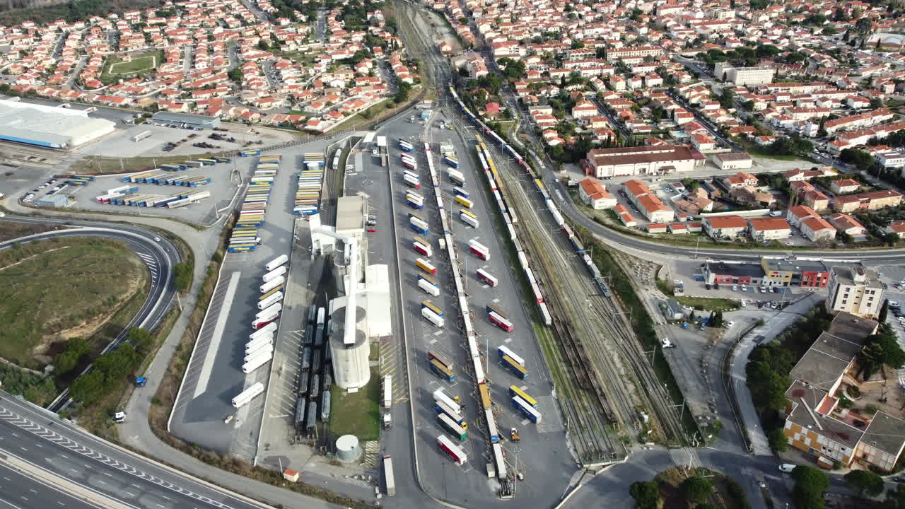 Aerial view of a busy trucking and rail terminal