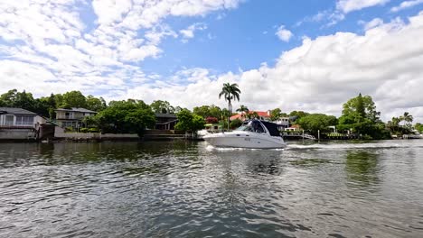 a boat travels along the scenic river