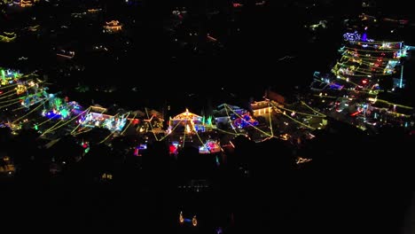 valencia winter wonderland neighborhood illuminated christmas time, top down aerial view