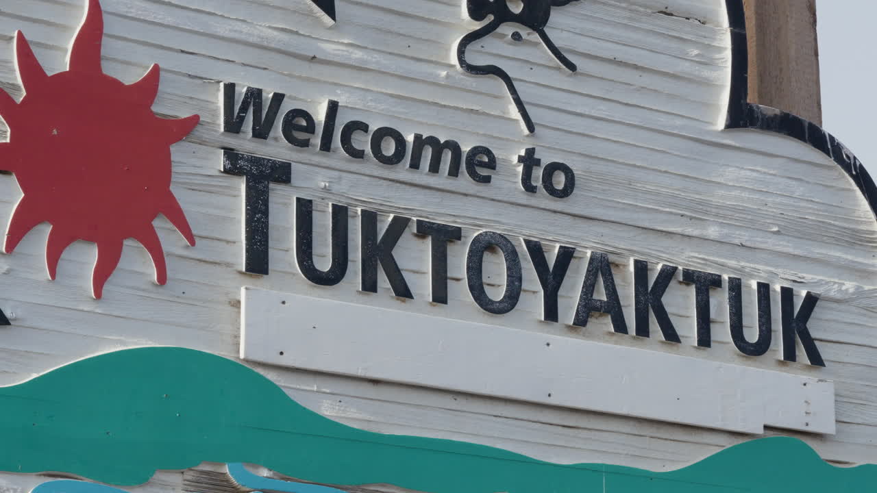 Welcome To Tuktoyaktuk Sign At The Town Limit In NWT, Canada - Close Up