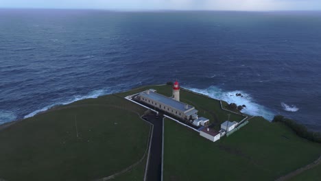 Aerial-view-of-Picturesque-viewpoint-with-Albarnaz-Lighthouse-Azores