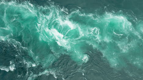turquoise saltstraumen maelstrom whirlpool and vortex current; drone top down