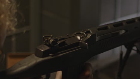 close up of ruger mini-14 semi-automatic rifle firing a shot