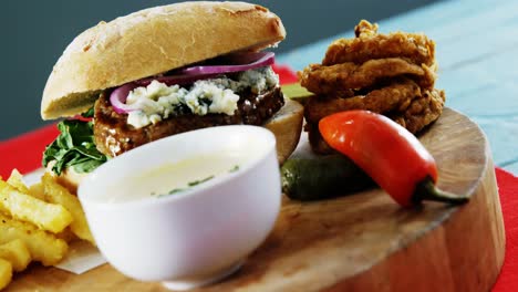 Snacks-with-mayonnaise-on-wooden-board