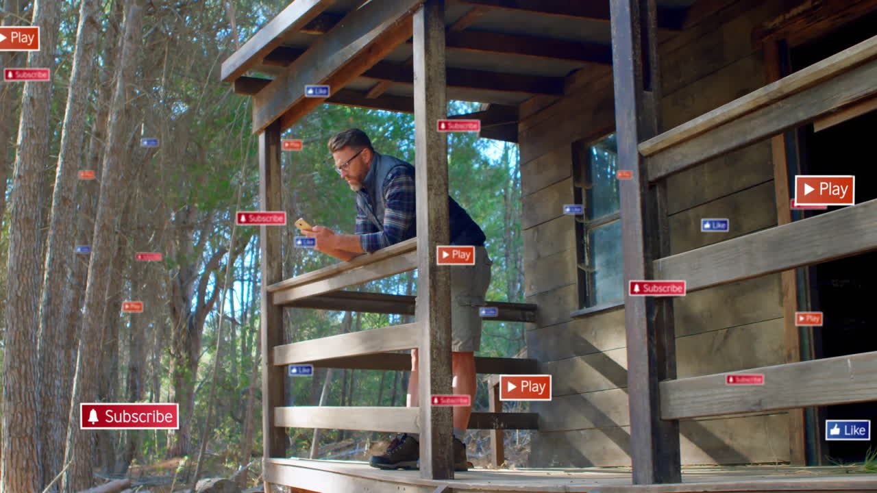 On rustic porch in forest, man surrounded by social media animation icons