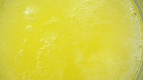 boiling yellow liquid
