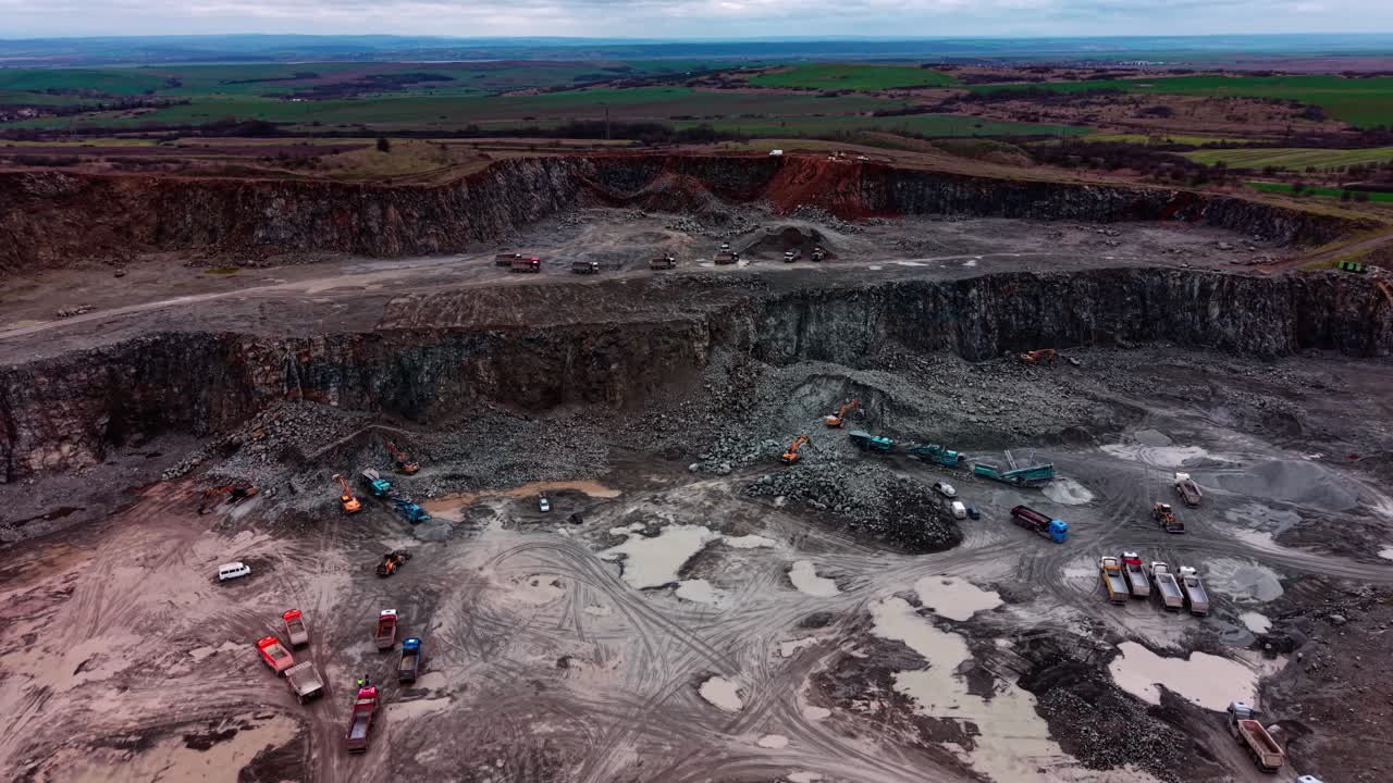 Granite quarry site showing equipment and rock extraction process