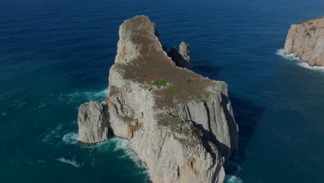 Flying-over-Pan-di-Zucchero-on-the-island-of-Sardinia,-near-Masua