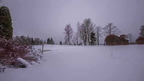 Old-farmstead-and-moody-rural-day-in-winter-season,-fusion-time-lapse