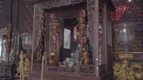 meditating buddha statue at the penang peranakan museum in georgetown, penang, malaysia - panoramic shot