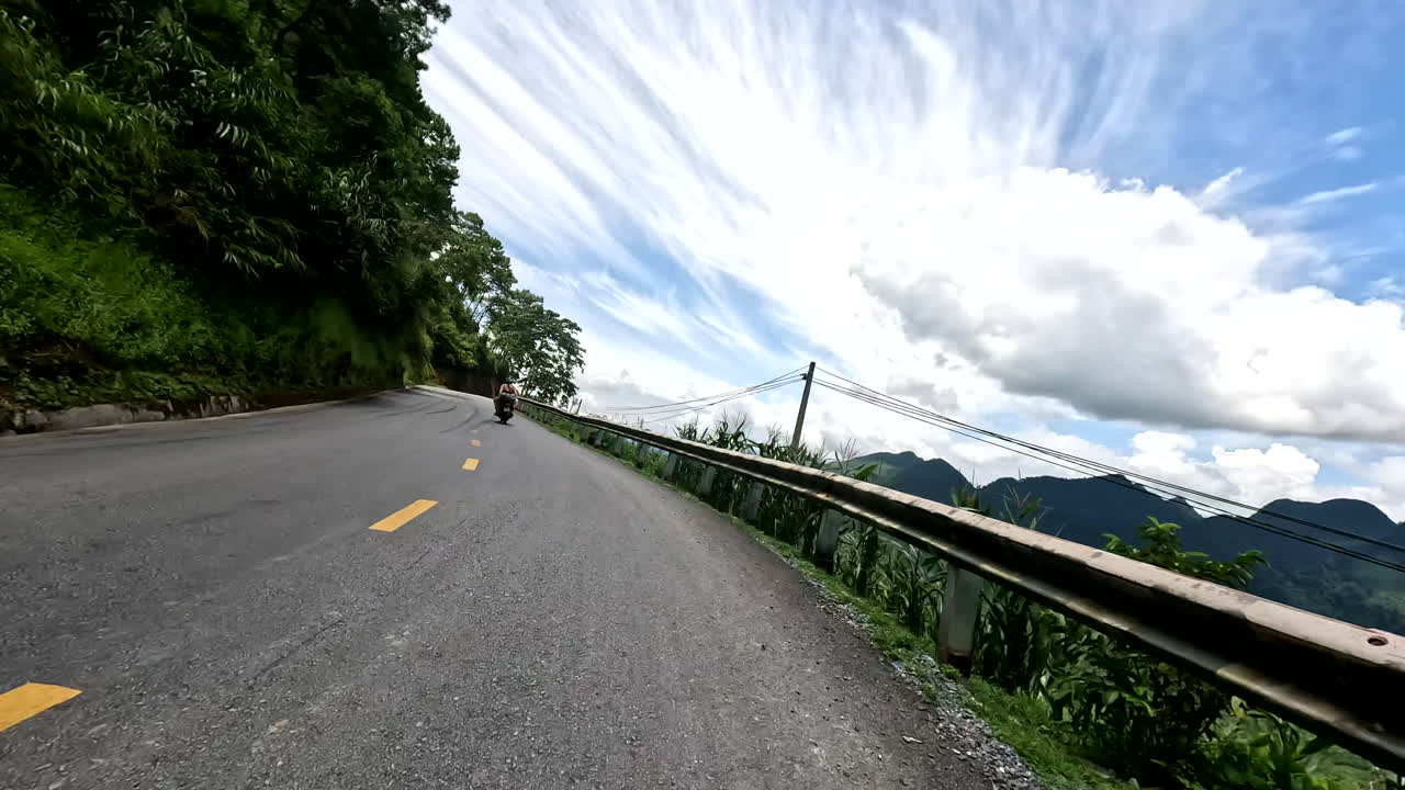 Motorcycle Riders On The Scenic Roads Of Ha Giang Loop In Vietnam. POV Shot