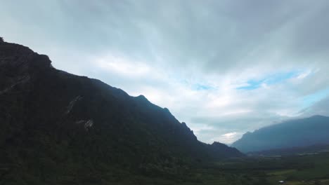 dramatic mountain landscape with overcast sky