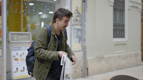 street magician performing rope trick