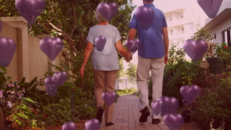 animación de corazones púrpuras sobre una pareja enamorada caminando y tomados de la mano.