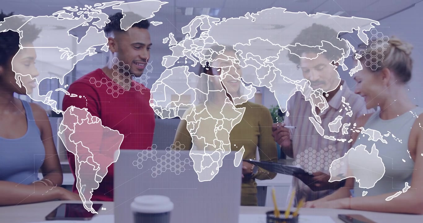 Five-person team huddling, tapping tablet showing global overlay on laptop for business plan